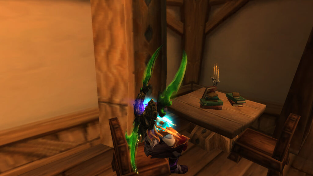 WoW The Night Elf is sitting at a table with books